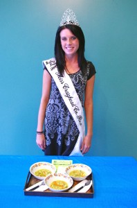 This image shows Bailey Davis with her recipe Farmers Market Soup. Bailey was a contestant in the Miss Arkansas Rice Contest.