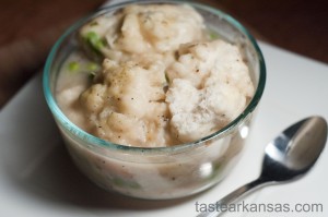 This image shows a warm, creamy bowl of chicken and dumplings. The dumplings are soft, moist and fluffy. The chicken is tender and juicy. The recipe below is one that everyone should try.