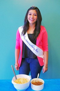 Stephanie Sanchez shows off her bowl of Excellent Rice at the Miss Arkansas Rice Contest