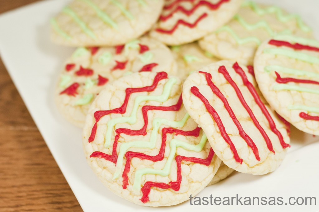 a plate of frosted cookies made from a box of cake mix