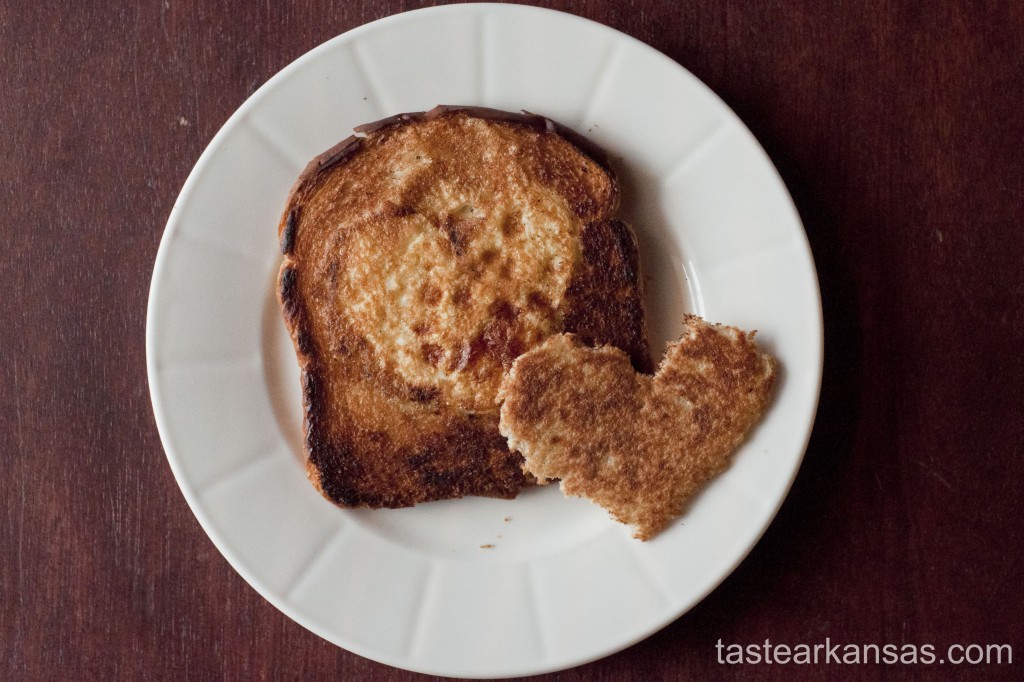 this photo is of a traditional egg in a hole with a valentine's day twist