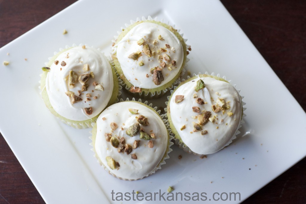 This image is of St. Patrick's Day Pistachio Cupcakes on a white plate
