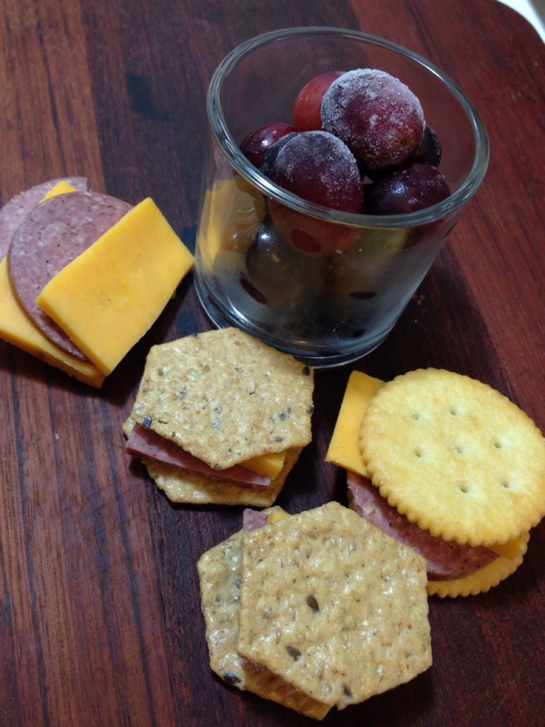 Kids lunches cheese, crackers, grapes