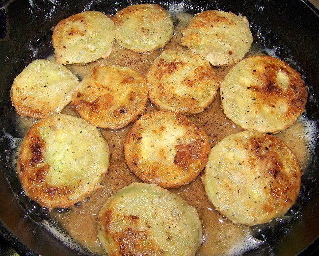 Fried green tomatoes in pan