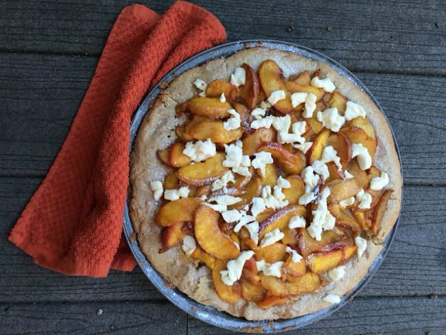 Peach pizza is served